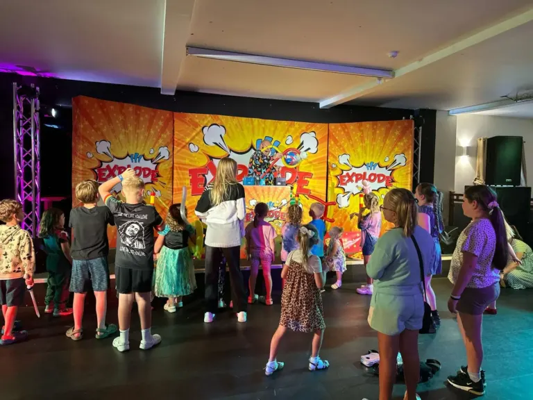 Children taking part on stage during a Chunkie Russell family show
