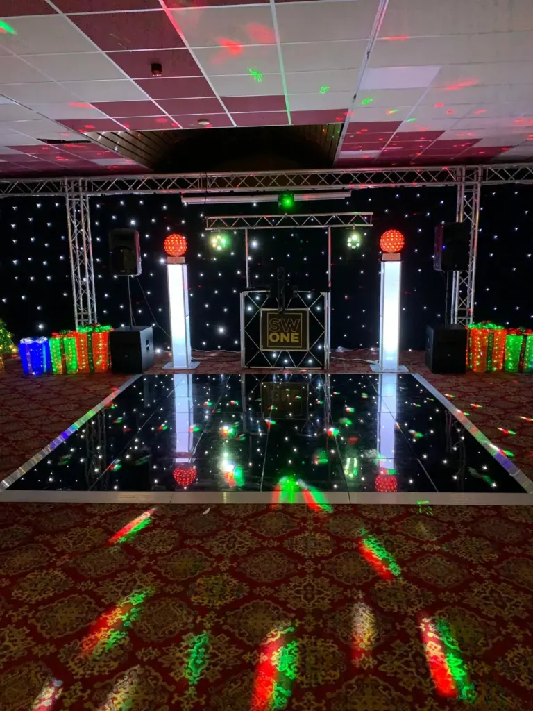 Colourful party disco lights on the dance floor