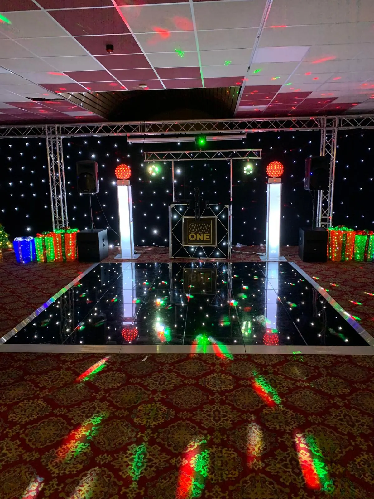 Colourful party disco lights on the dance floor