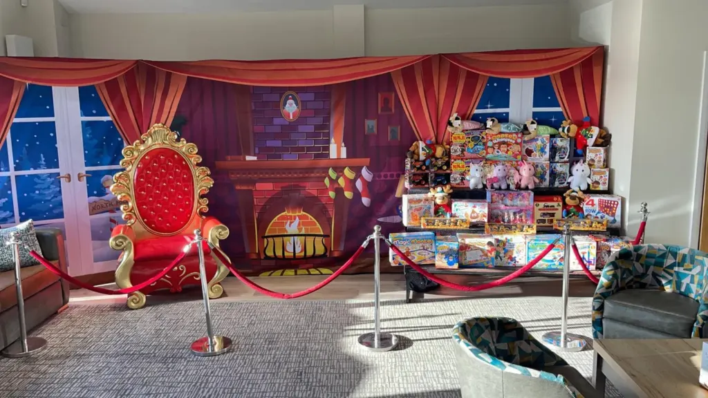 Father Christmas's red grotto throne decorated for Christmas
